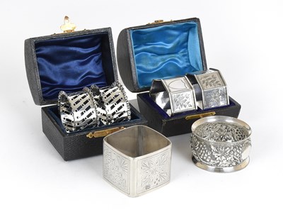 Lot 89 - Six Assorted Silver Napkin-Rings, including...