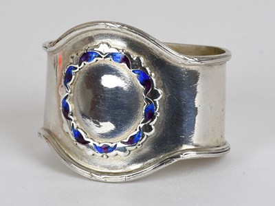 Lot 22 - A George V Silver and Enamel Napkin-Ring, by...