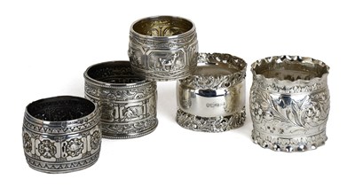 Lot 61 - Five Assorted Silver Napkin-Rings, three...