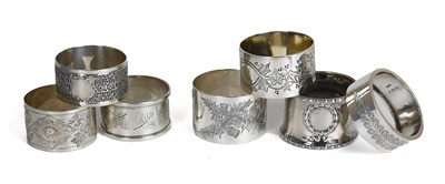 Lot 64 - Seven Assorted Silver Napkin-Rings, each...