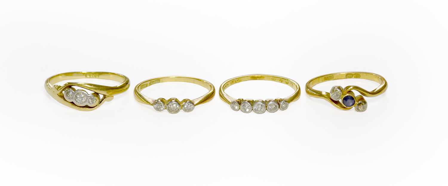 Lot 57 - Four Gem-Set Rings, comprising of a diamond...