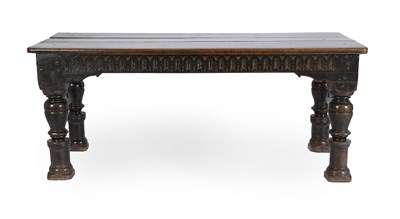 Lot 306 - A Joined Oak Dining Table, the three-plank top...