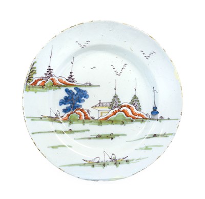 Lot 209 - A Liverpool Delft Plate, circa 1750, painted...