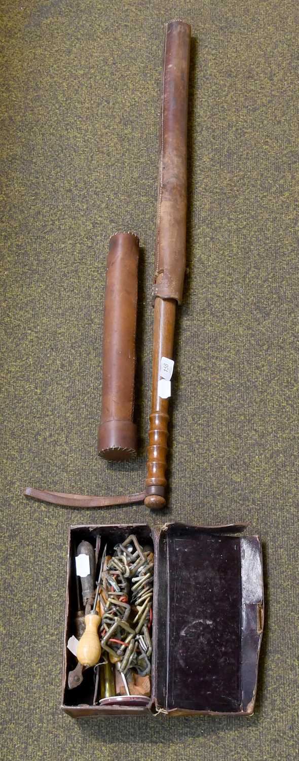 Lot 158 - A Wooden Truncheon in Leather Case; a leather...