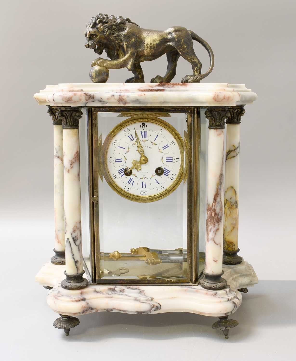 Lot 164 - A French Marble Striking Four Glass Mantel...