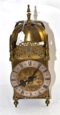 Lot 4 - A lantern style mantel clock