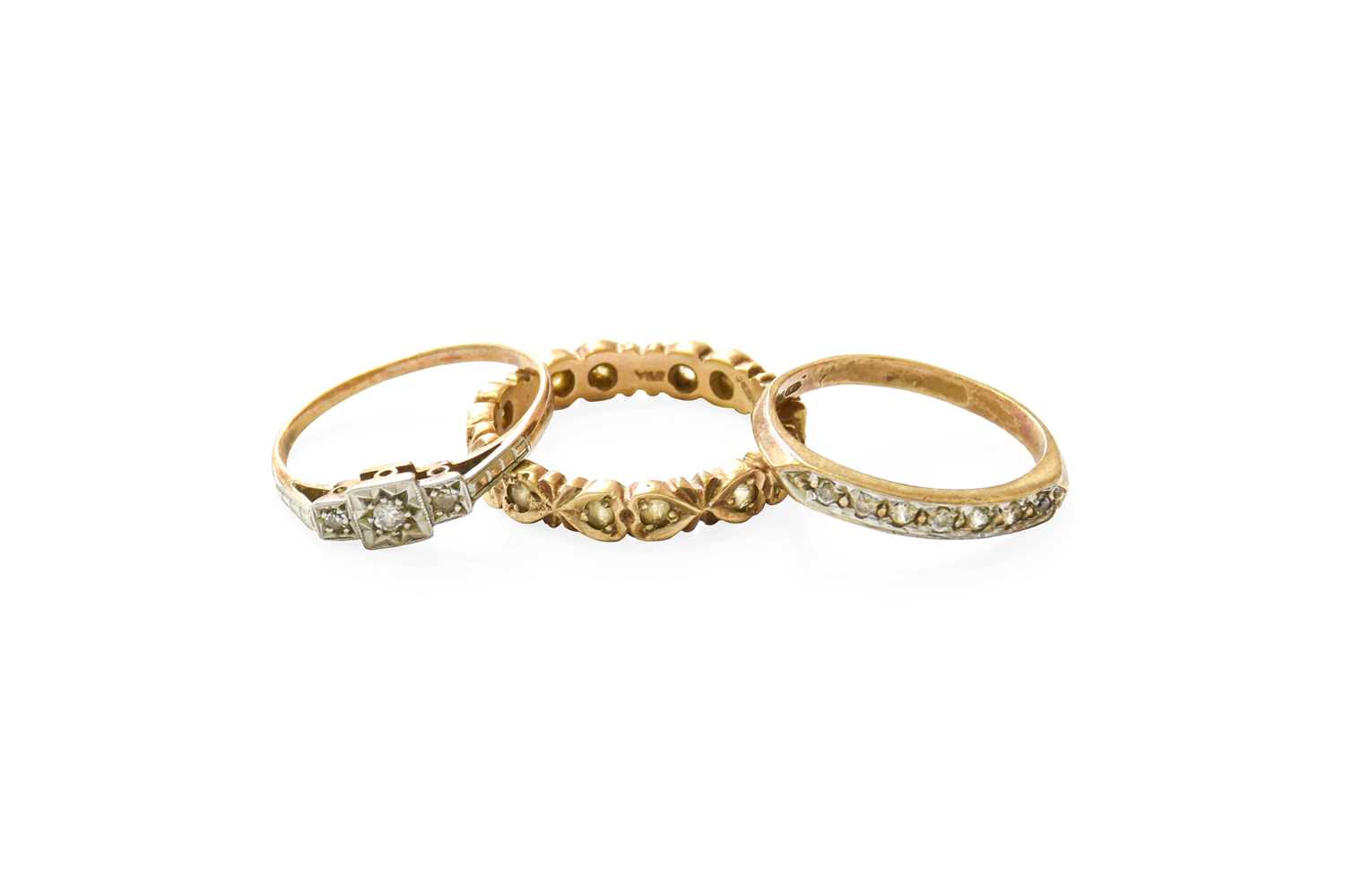 Lot 90 - Three Dress Rings, comprising of a diamond...