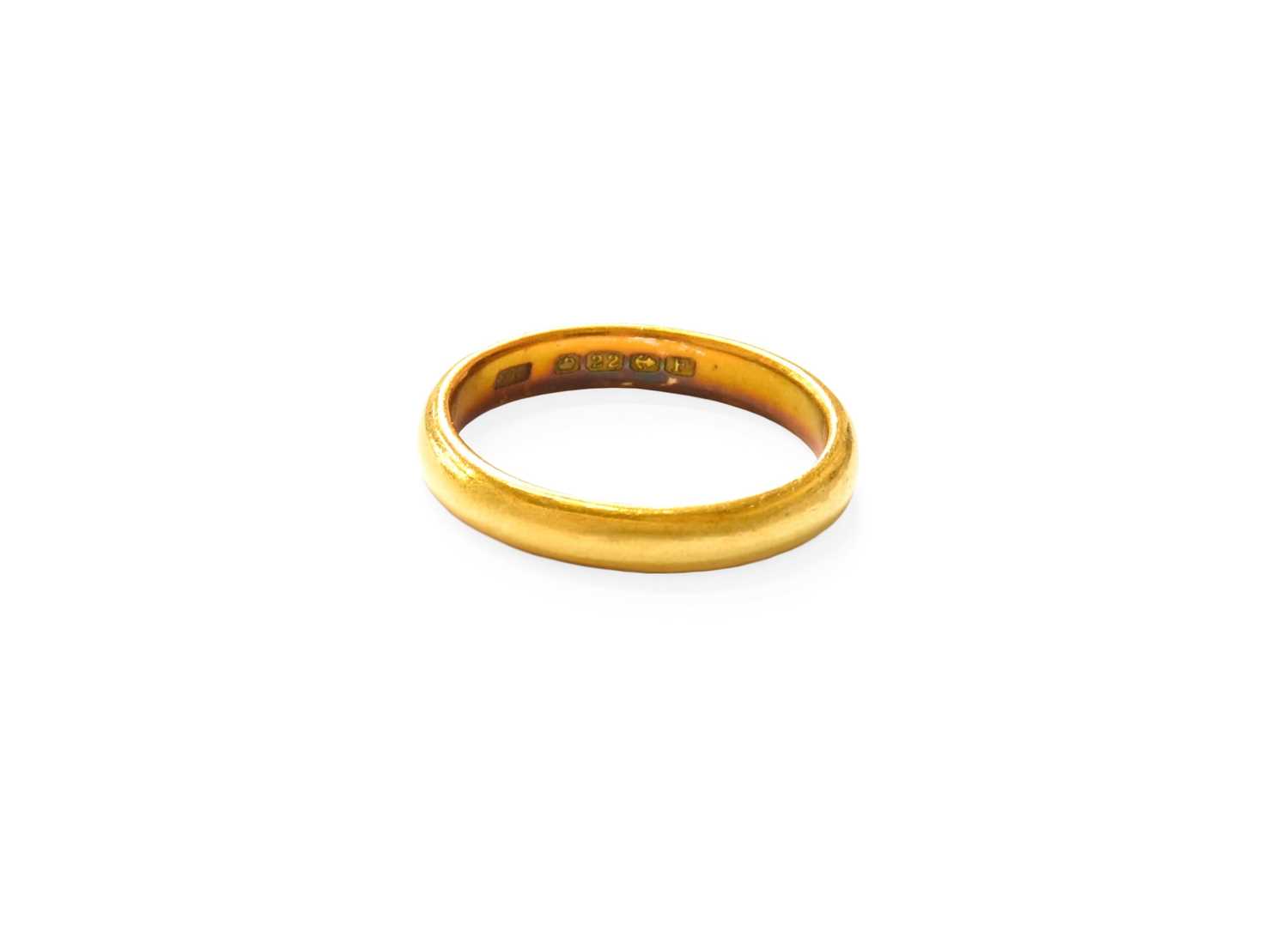 Lot 75 - A 22 Carat Gold Band Ring, finger size N1/2