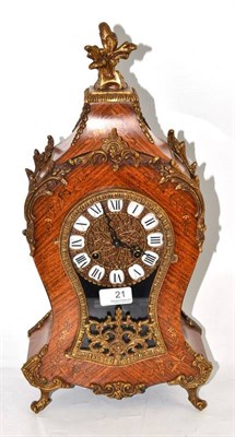 Lot 21 - A reproduction striking mantel clock