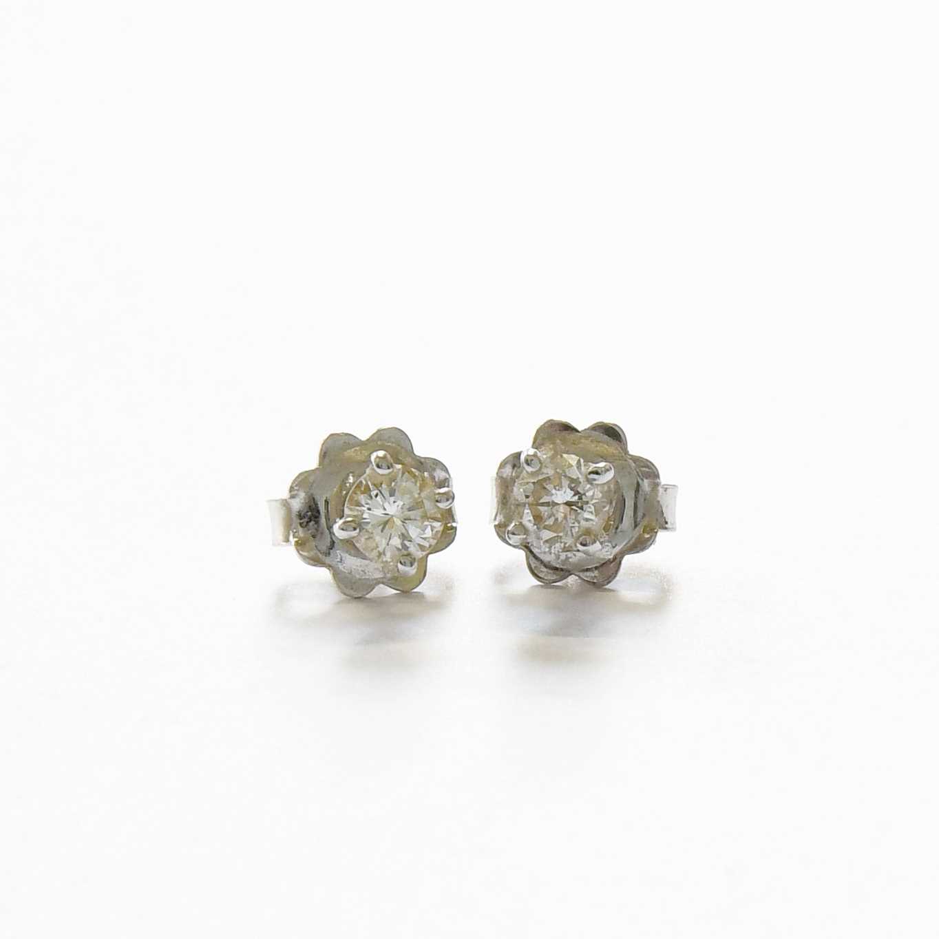Lot 103 - A Pair of Diamond Solitaire Earrings, the...