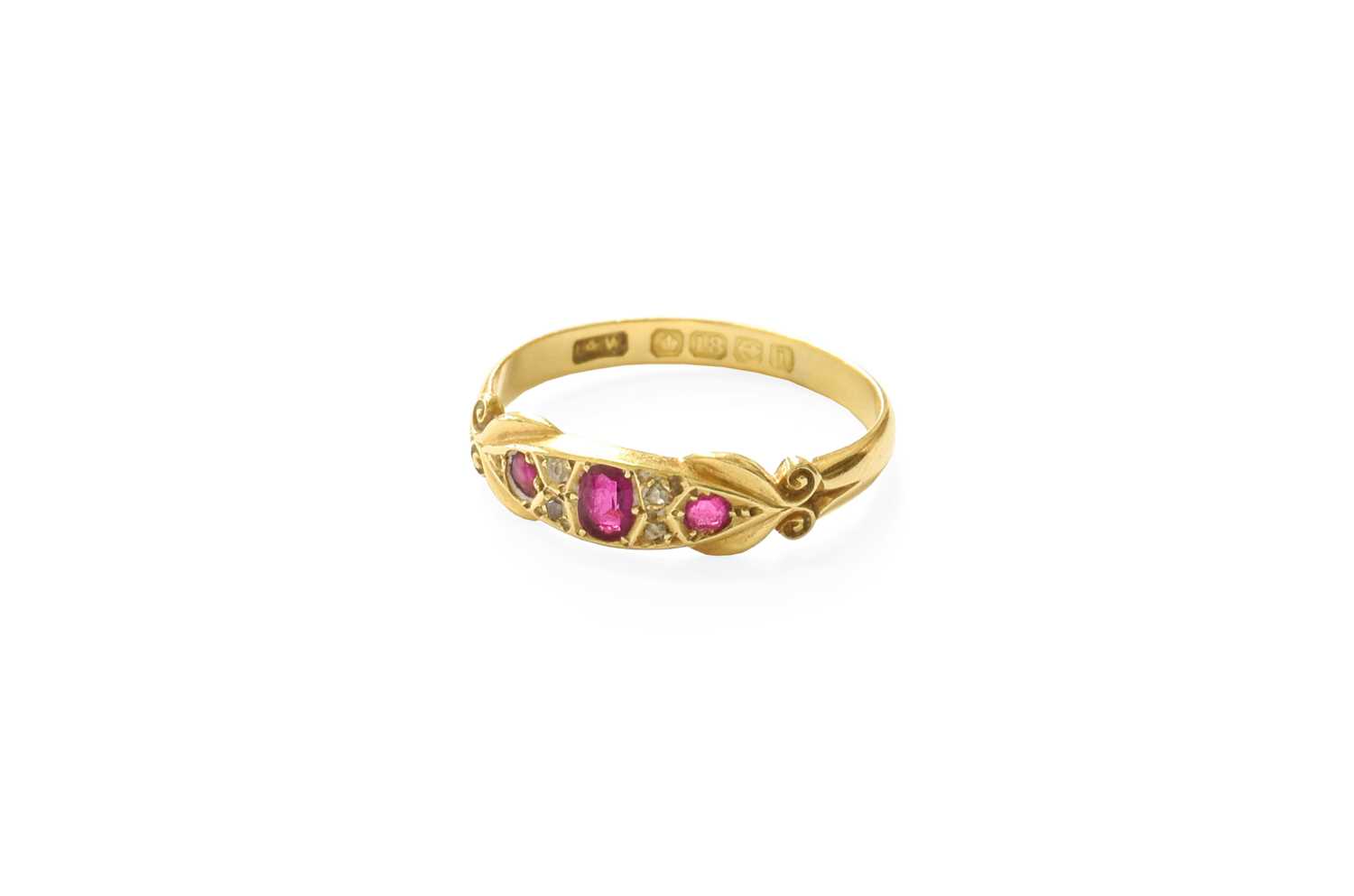 Lot 86 - An 18 Carat Gold Ruby and Diamond Ring, three...