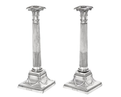 Lot 2083 - A Pair of German Silver Candlesticks