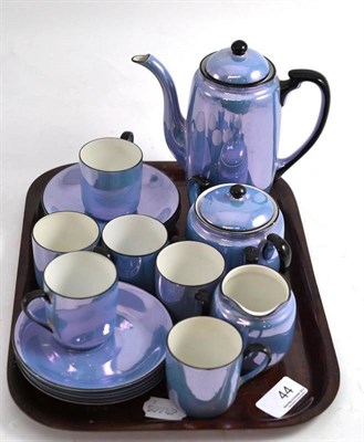 Lot 44 - A Noritake blue iridescent glaze coffee set