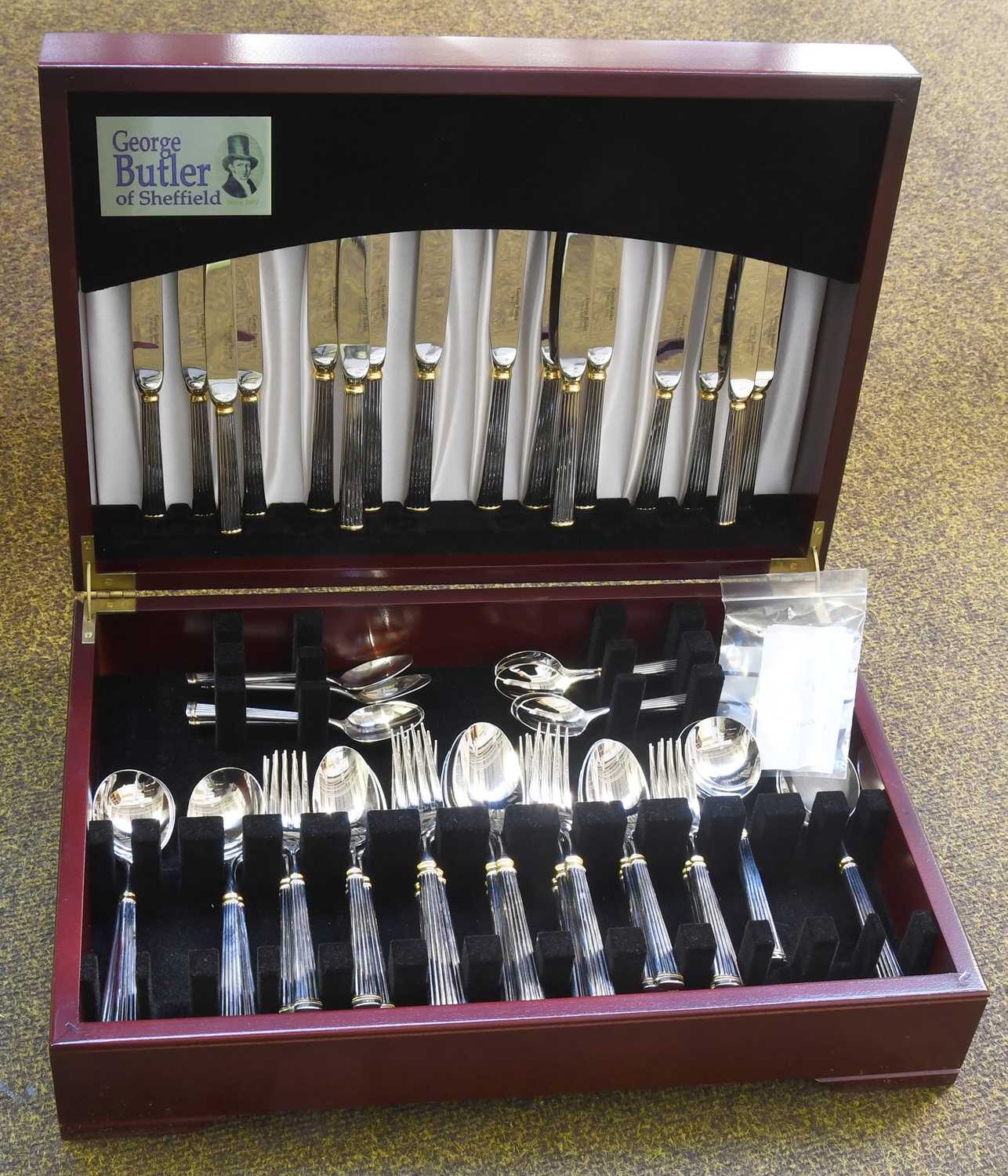 Lot 177 - A George Butler of Sheffield Canteen of Gilt...