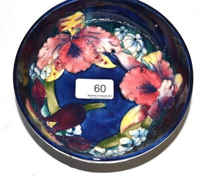 Lot 60 - Walter Moorcroft orchid and spring flowers pattern bowl