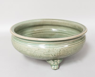 Lot 223 - A Chinese Longquan Celadon Tripod Censer, Ming...