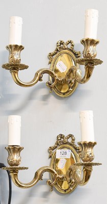 Lot 128 - A Pair of Ribbon Tied Brass Twin Light Wall...
