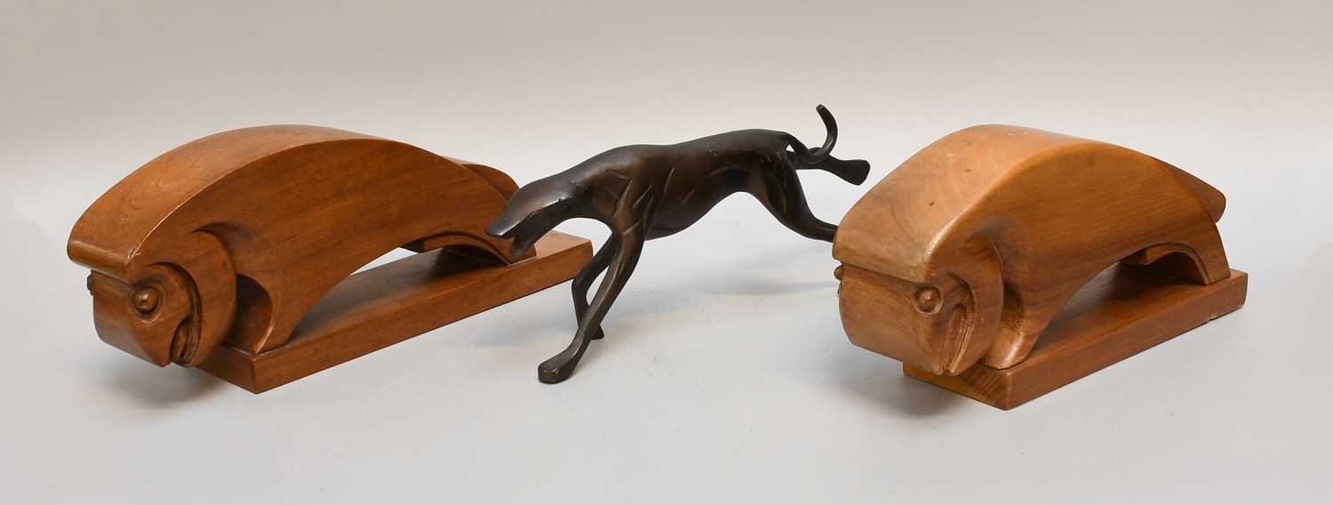 Lot 145 - A Near Pair of Carved Ram From Bookends, each...