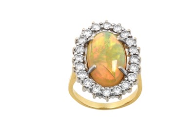 Lot 2272 - An Opal and Diamond Cluster Ring the oval...