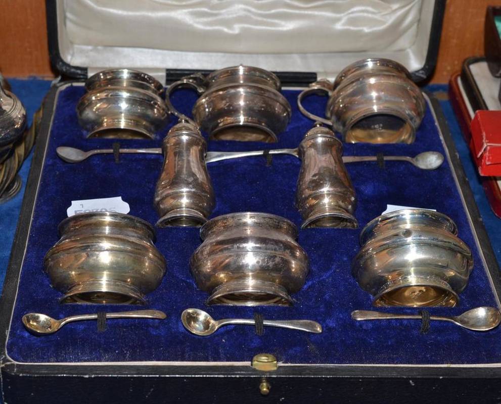 Lot 78 - Cased eight piece silver cruet and spoons