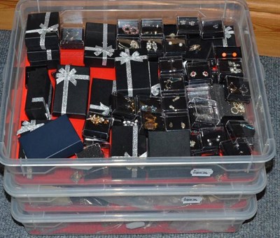 Lot 85 - A large quantity of costume jewellery in three boxes, including earrings, brooches etc