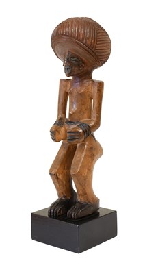 Lot 342 - A 20th Century Lwena Figure, Angola, of light...