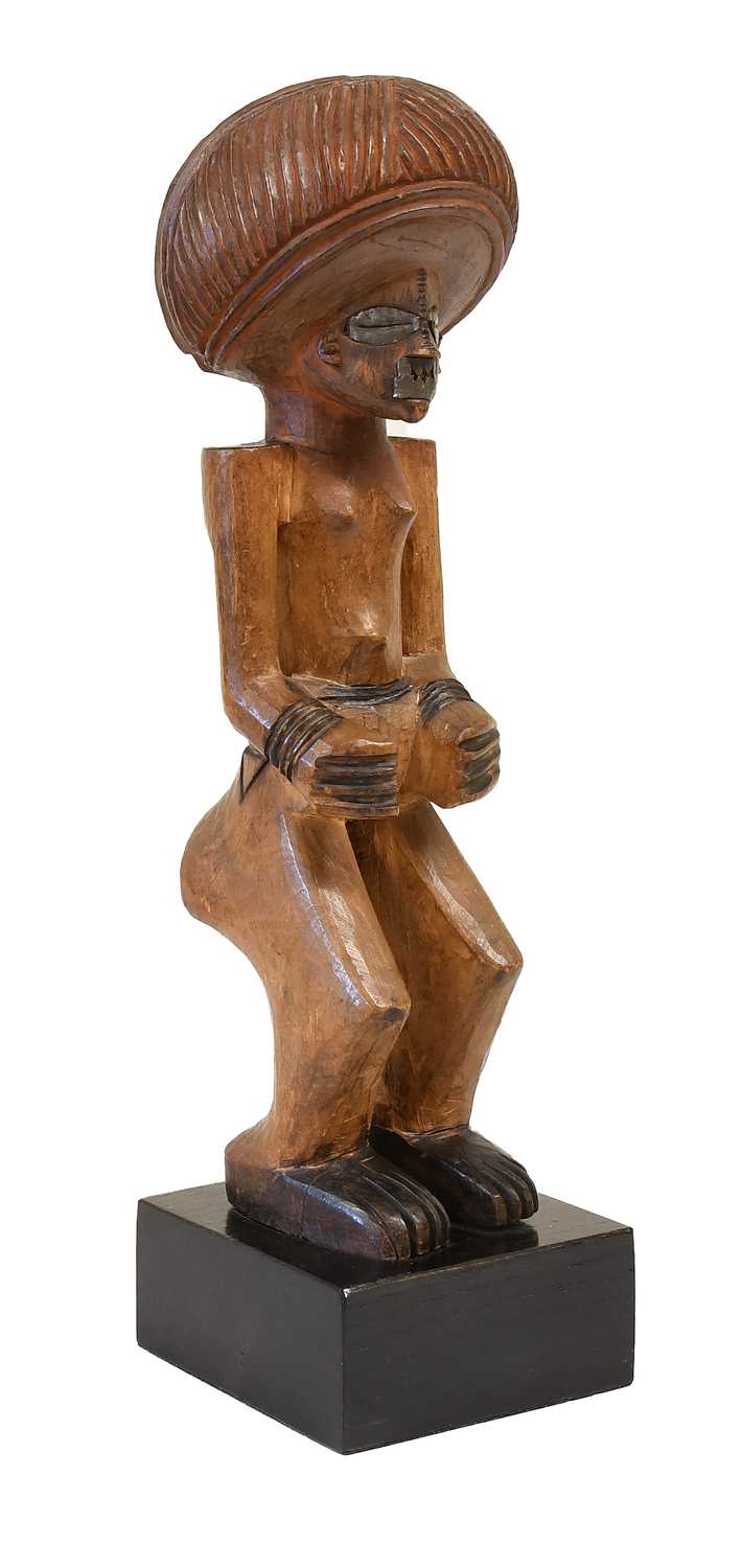 Lot 342 - A 20th Century Lwena Figure, Angola, of light...