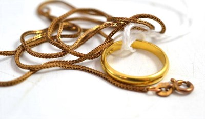 Lot 98 - An 18ct gold band ring and a 9ct gold snake link chain