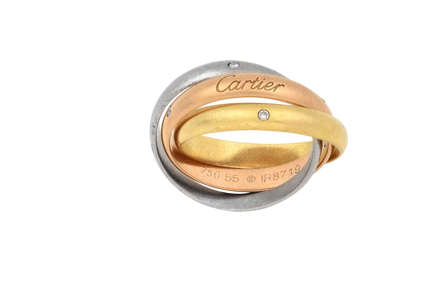 Lot 2250 - A Diamond Trinity Ring, by Cartier comprising...