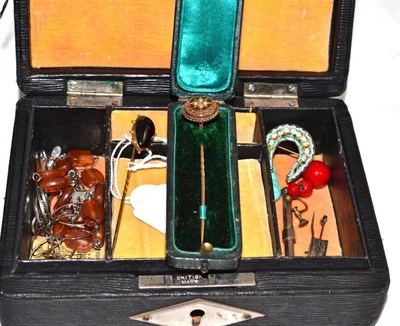 Lot 103 - A box containing a small quantity of jewellery, including two stick pins, a pencil, costume...