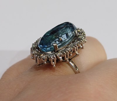 Lot 2256 - An Aquamarine and Diamond Cluster Ring the...