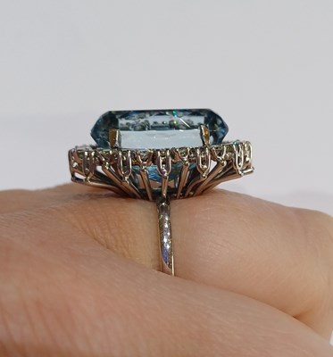 Lot 2256 - An Aquamarine and Diamond Cluster Ring the...