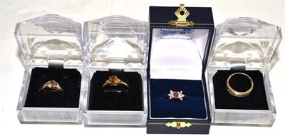 Lot 121 - A 9ct gold ruby sapphire and diamond ring, a 9ct gold diamond ring, a ring stamped '9K' and a dress