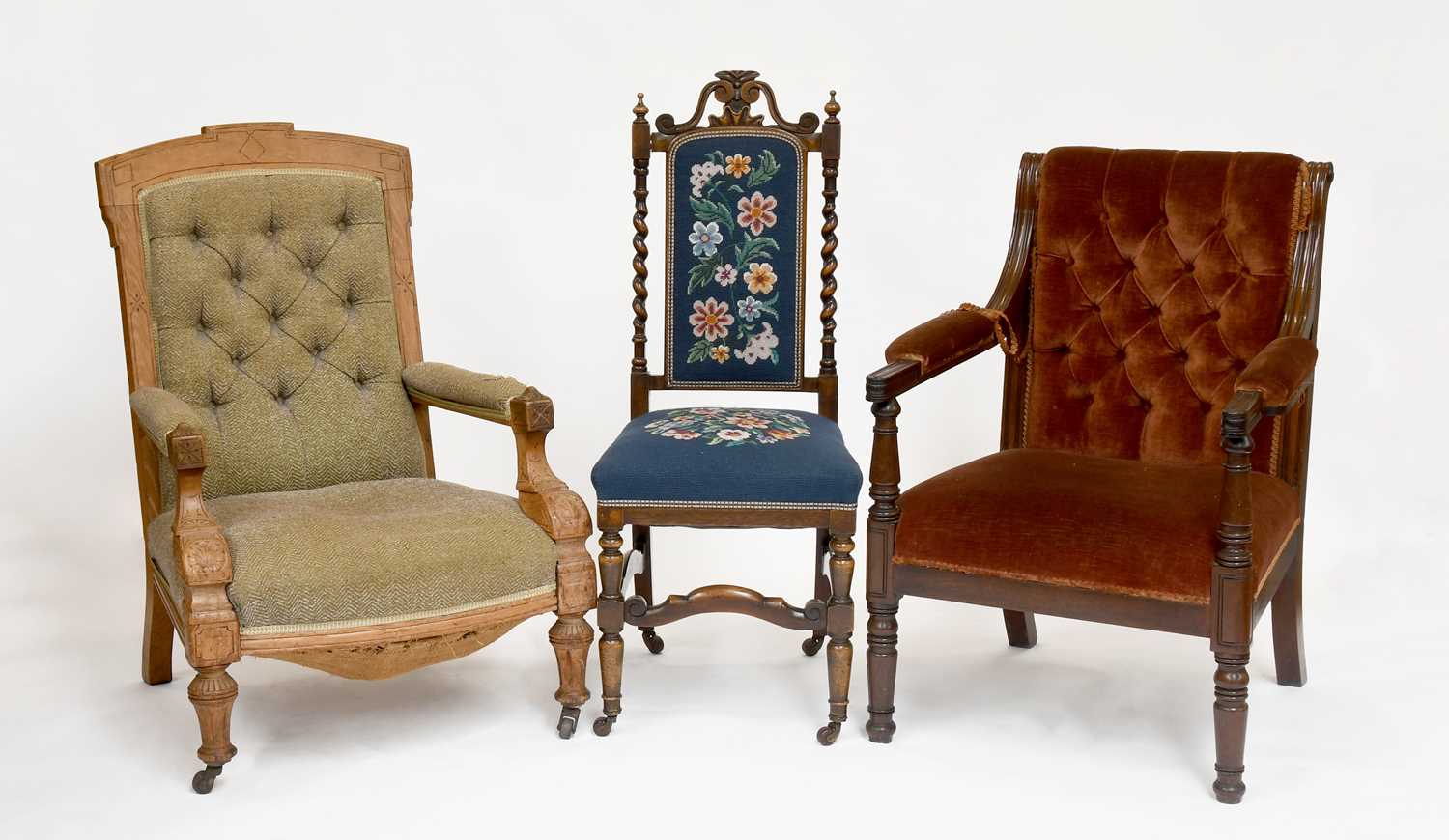 Lot 1147 - An Oak Open Arm Library Chair, with button...