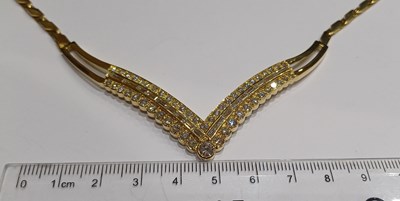 Lot 2212 - An 18 Carat Gold Diamond Necklace the central...