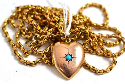 Lot 127 - Heart locket set with turquoise on a chain stamped 9ct