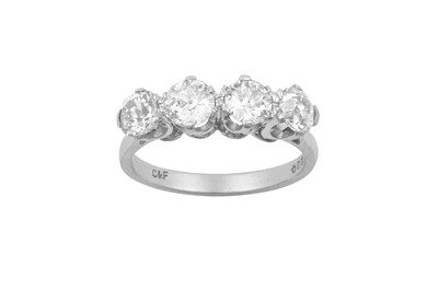 Lot 2271 - A Platinum Diamond Four Stone Ring the old cut...