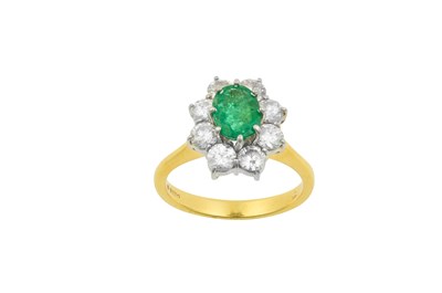 Lot 2229 - An 18 Carat Gold Emerald and Diamond Cluster...