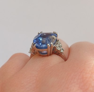Lot 2291 - An 18 Carat White Gold Sapphire and Diamond...