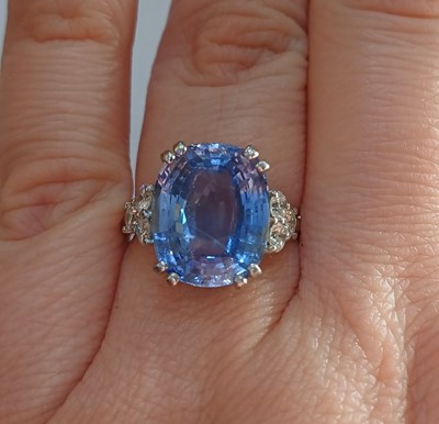 Lot 2291 - An 18 Carat White Gold Sapphire and Diamond...