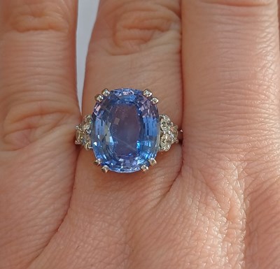 Lot 2291 - An 18 Carat White Gold Sapphire and Diamond...