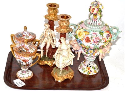 Lot 171 - A pair of Dresden twin handled urns and covers, a pair of Continental figural candlesticks and...