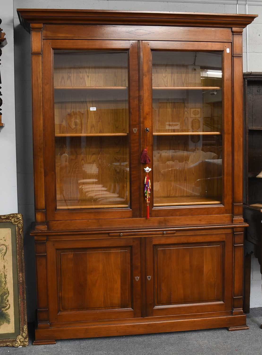 Lot 1340 - A Multiyork Mastercraft Bookcase, glazed upper...