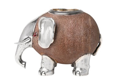 Lot 2078 - A Russian Gem-Set Silver-Mounted Sandstone Match-Holder in the Form of an Elephant