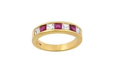 Lot 2205 - An 18 Carat Gold Ruby and Diamond Half Hoop...