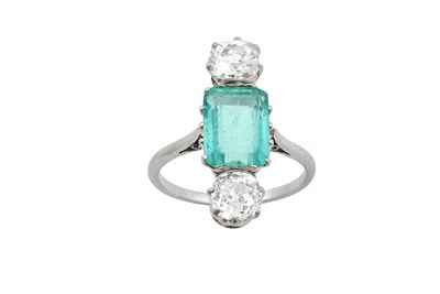 Lot 2242 - An Emerald and Diamond Three Stone Ring the...