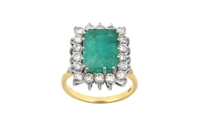 Lot 2233 - An Emerald and Diamond Cluster Ring the...