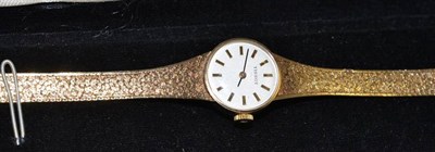 Lot 213 - A lady's 9ct gold wristwatch signed Tissot