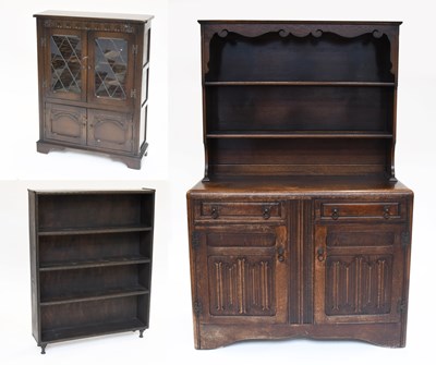 Lot 1163 - A Stained Oak Open Bookcase, 20th century,...