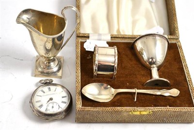 Lot 216 - Cased plated children's Christening set, silver helmet cream jug and silver pocket watch (3)